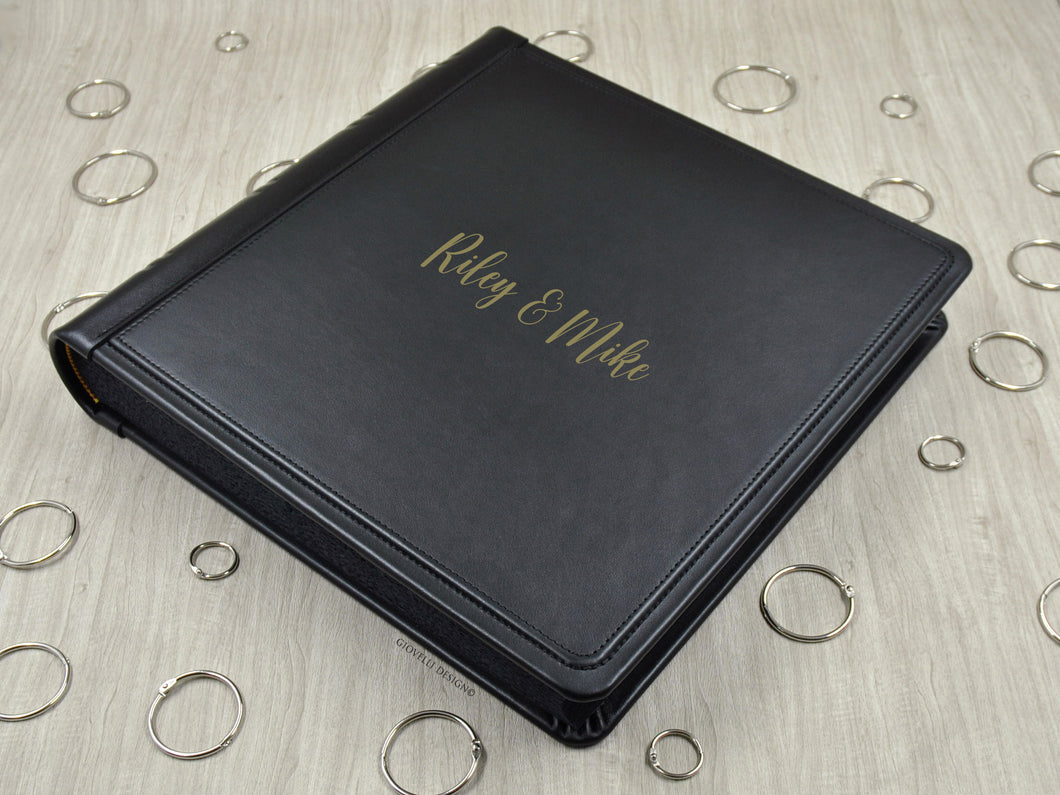 example of matte gold vinyl personalization on a black leather cover of a photo album by Giovelli Design