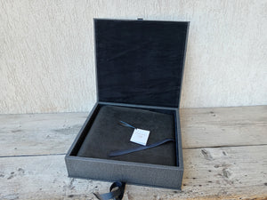 open black box with photo album by Giovelli Design