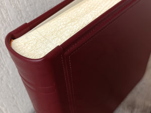 Upholstered in True Burgundy Leather Book of Memories by Giovelli Design