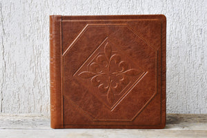 upholstered in leather photograph book for loved ones by Giovelli Design