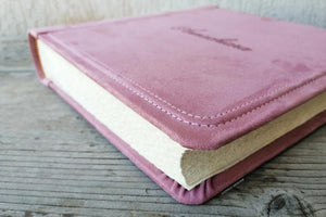 stylish finishes and seams on a pink photographic album by Giovelli Design