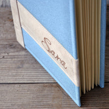 Load image into Gallery viewer, enchanting finishes and seams of a baby album by giovelli design
