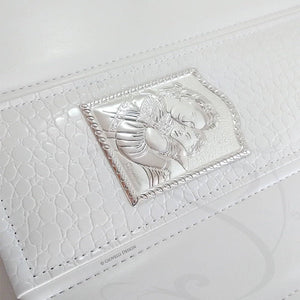 beautiful bi-laminated silver plaque on a photo album