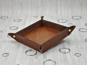 handmade in Italy coin tray with a hot stamped fleur de lis by Giovelli Design