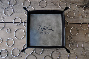 picture from above of a fancy leather valet tray with monogram and date by Giovelli Design